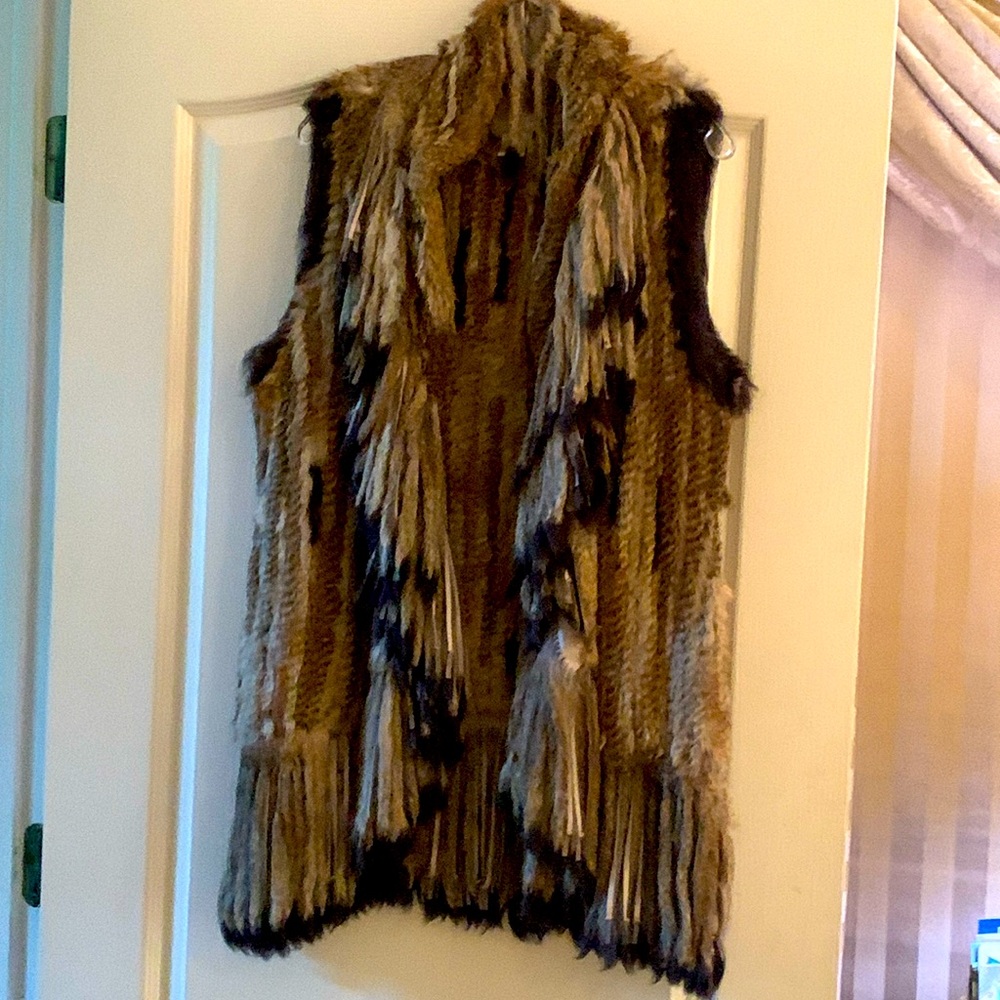 Rabbit fur vest with fringe. Never worn.